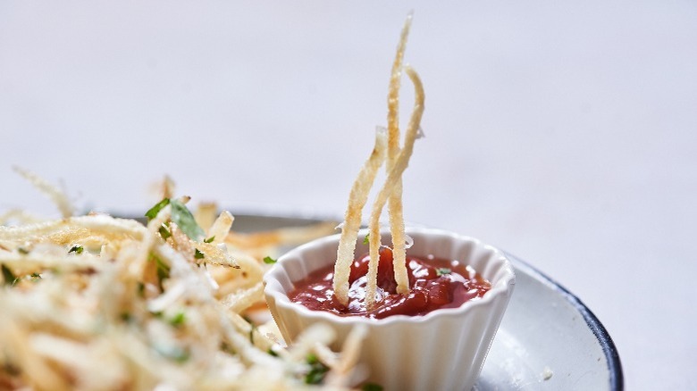 shoestring fries in ketchup