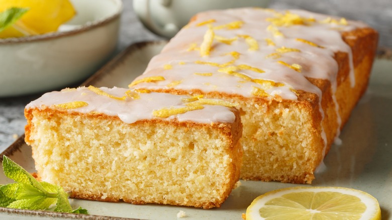 A loaf and slice of lemon pound cake