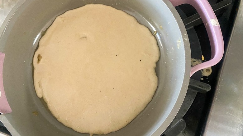 injera batter in pan