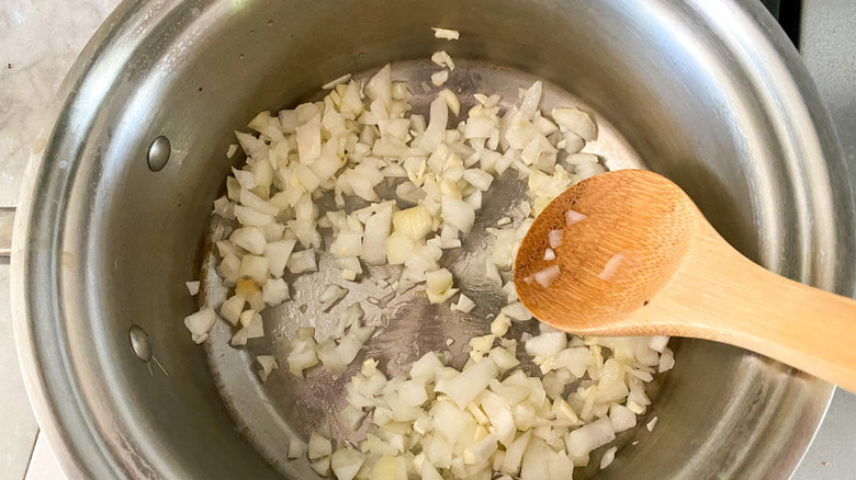 onion and garlic in pan