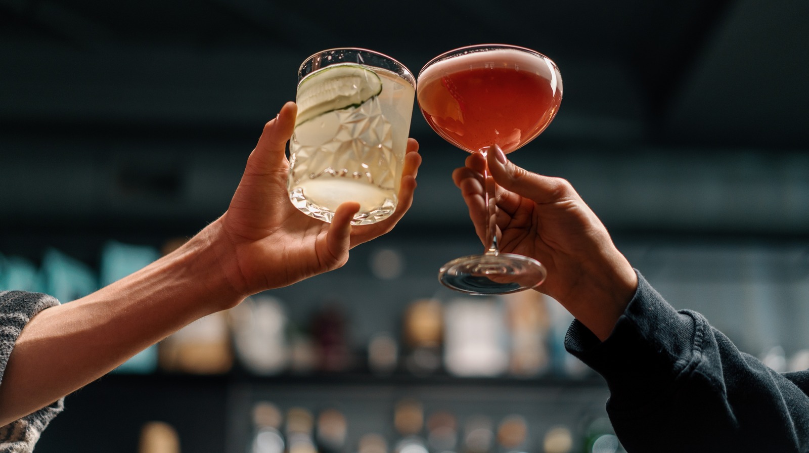 Expert barman is making cocktail featuring cocktail, shaker, and barman