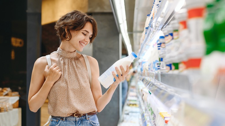 person buying milk