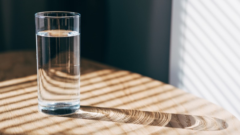 A glass of water on a table