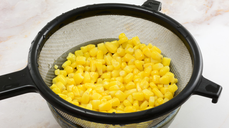 rinsing canned corn