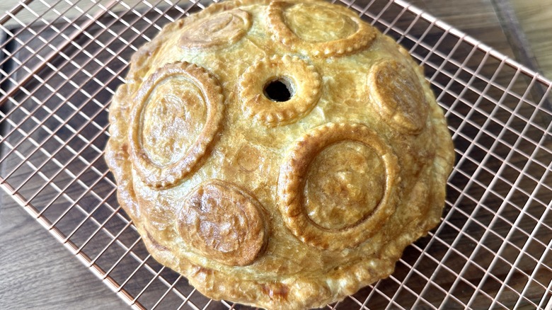 baked pithivier on wire rack