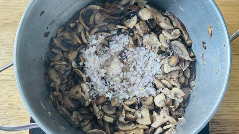 mushrooms and shallots in pan