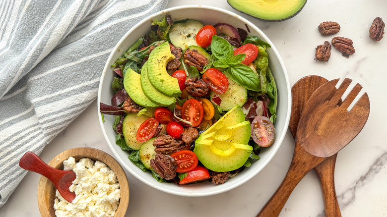 salad on plate with utensils