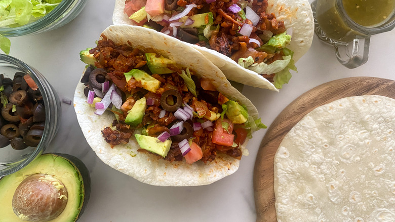 tofu-filled tacos in stand