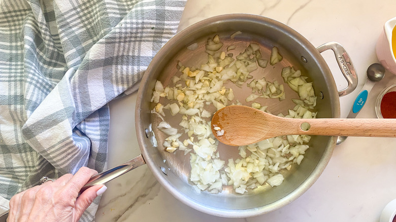 onion and garlic in pan