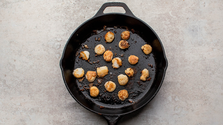 browned scallops in a pan