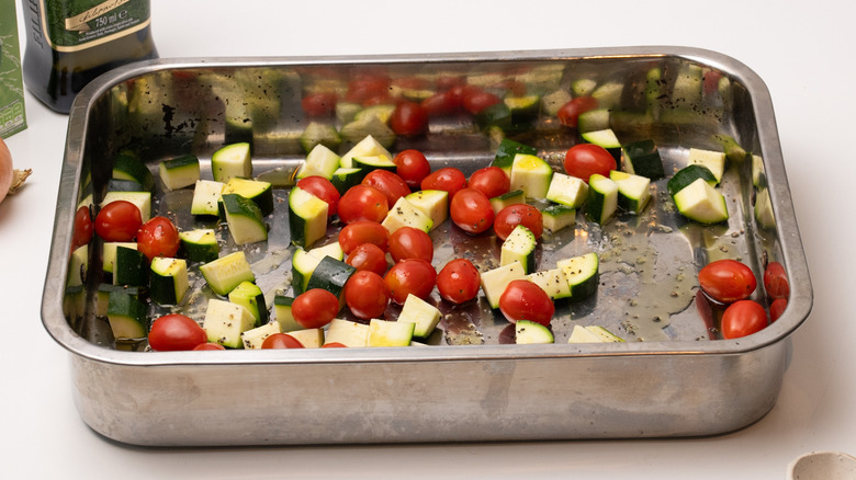 zucchini and tomatoes in tray