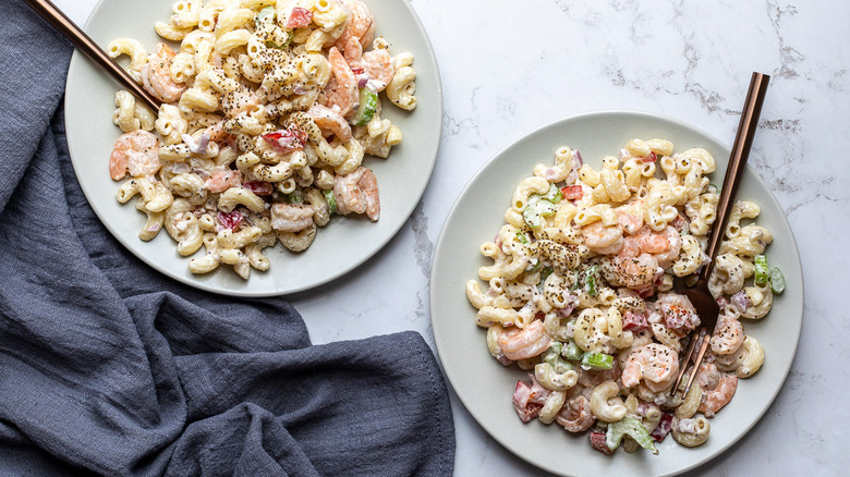 shrimp macaroni salad on plates