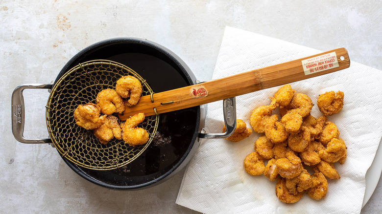 fried shrimp on paper towels