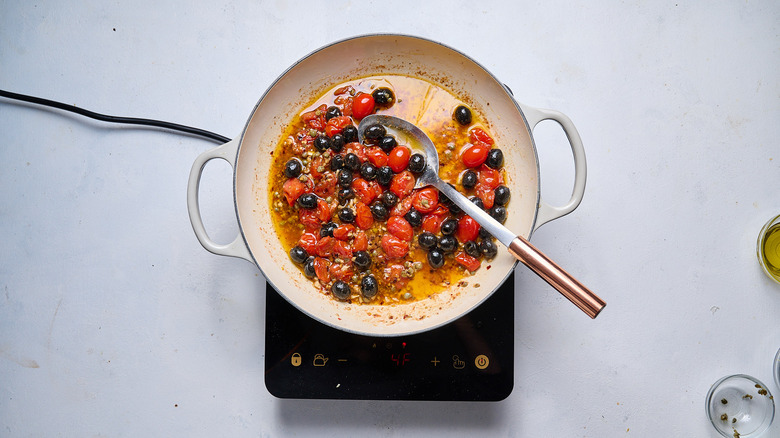 olives and capers in skillet