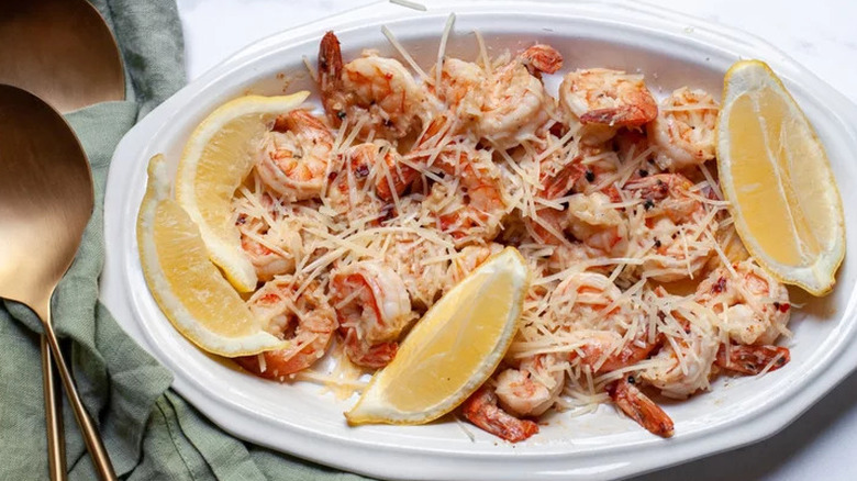 Shrimp with Parmesan and lemon wedges