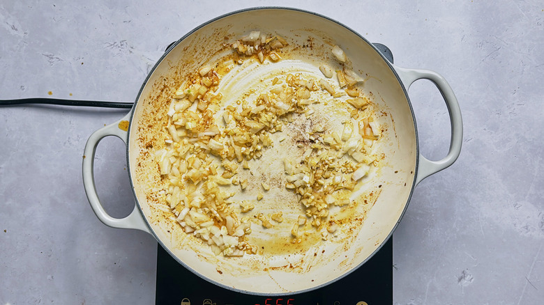 cooking onion in skillet