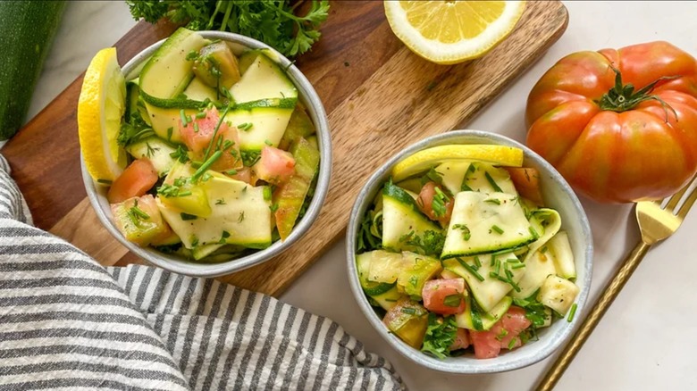 Two bowls of zucchini ribbon salad