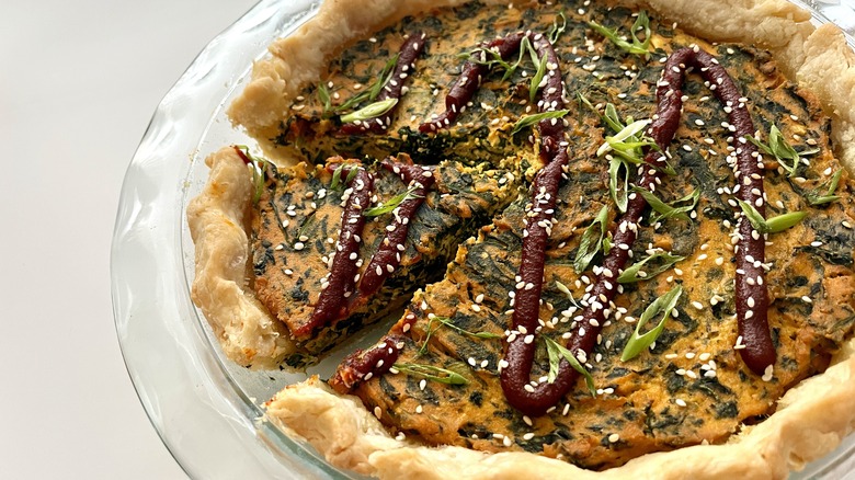 slice cut out of Sigeumchi Namul-Inspired Vegan Quiche