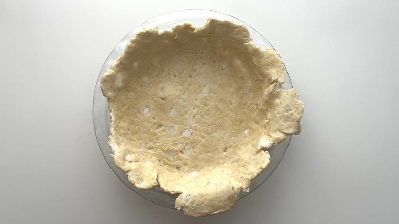 rolled out pie crust in a pie plate