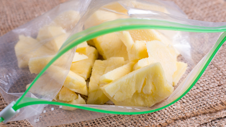 Cut pineapple chunks in a Ziploc plastic bag