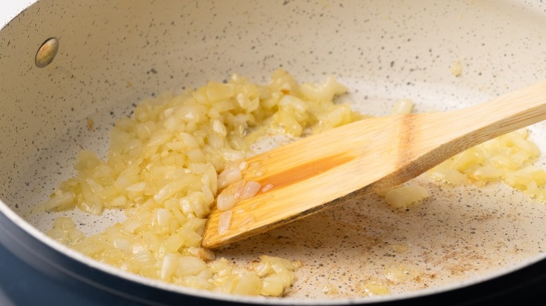 Pouring stock into a pan