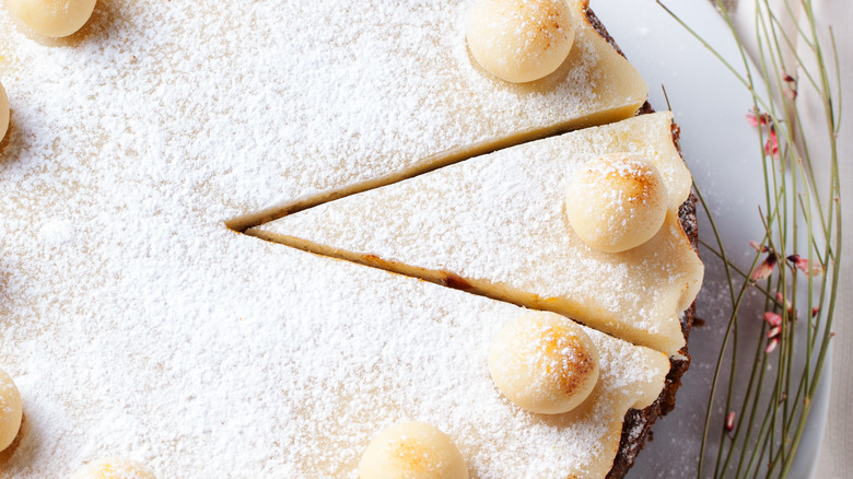 slice cut into a decorated Simnel cake