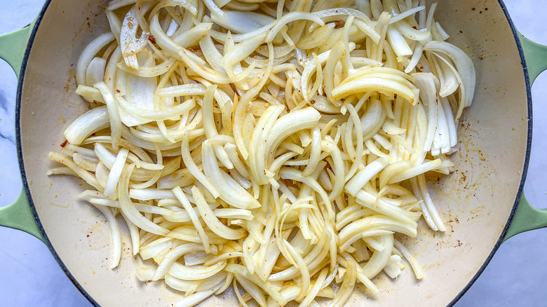 sliced onions in pan