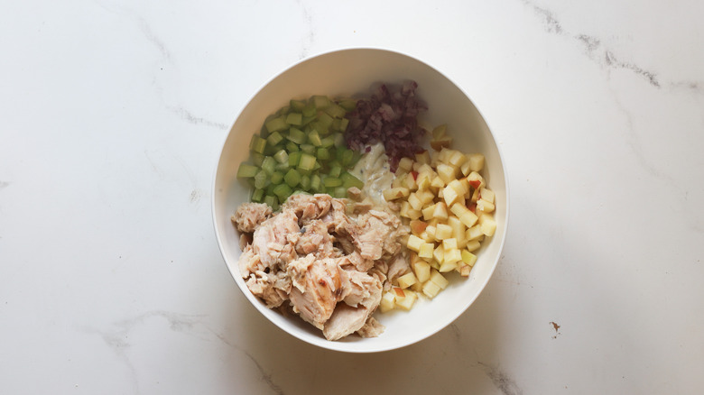 Cooked tuna added to bowl