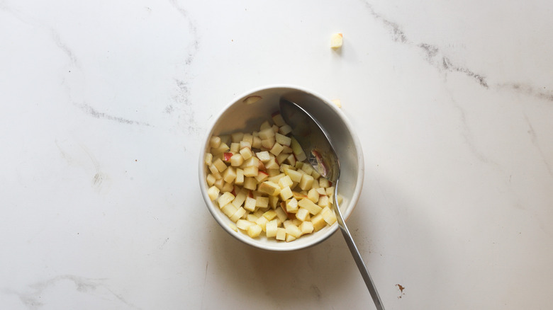 Apples tossed with vinegar