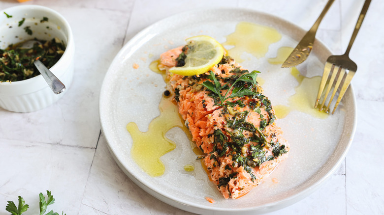 salmon on plate with chimichurri