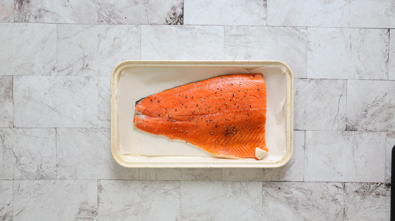 Salmon on baking sheet