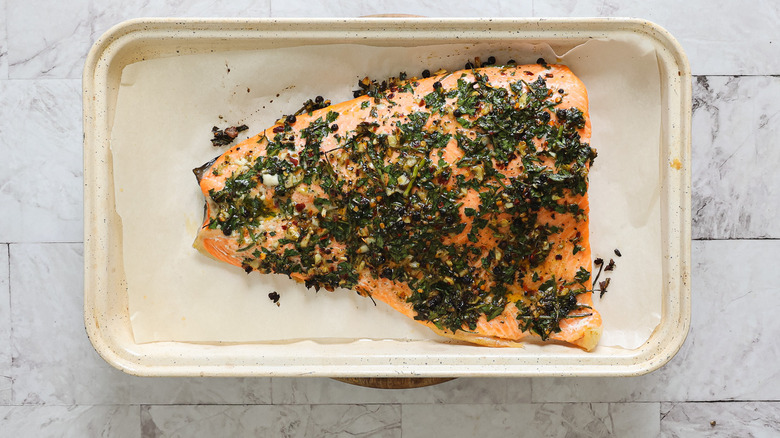 Baked salmon on baking sheet