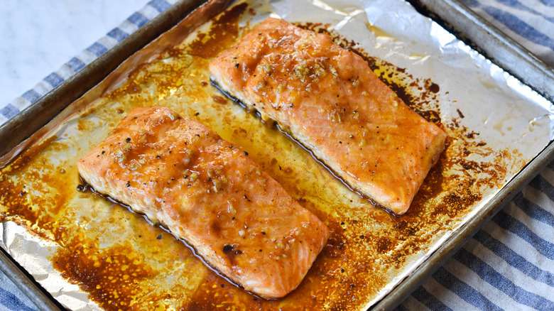 baked salmon on baking sheet