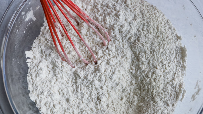 mixing blueberry bread dry ingredients