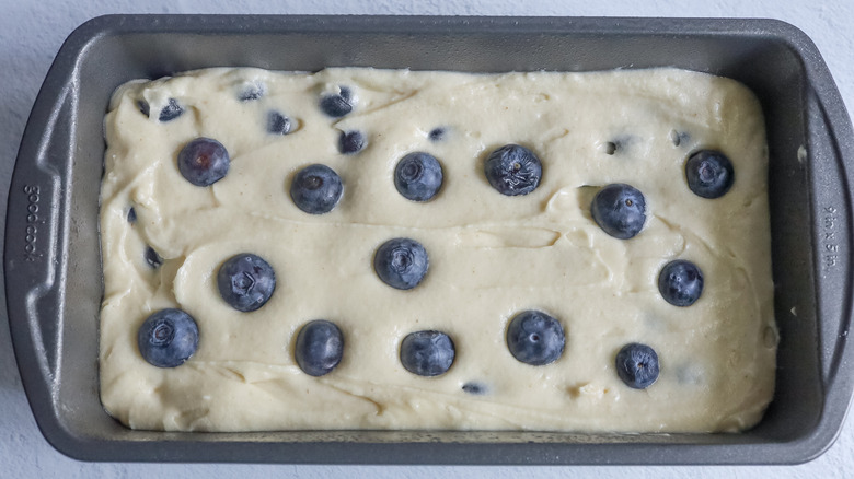 blueberry bread batter in pan