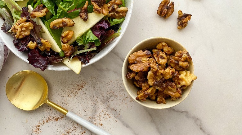 bowl of walnuts and salad