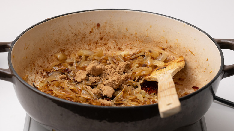 adding sugar to caramelized onions