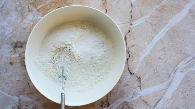 flour mixture in bowl with whisk