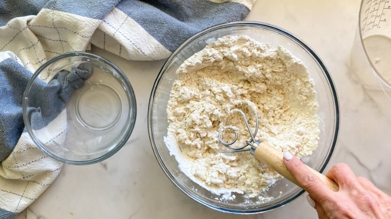 dough ingredients in glass bowl