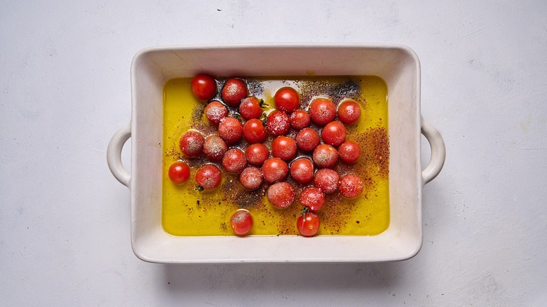 tomato and seasonings in baking dish