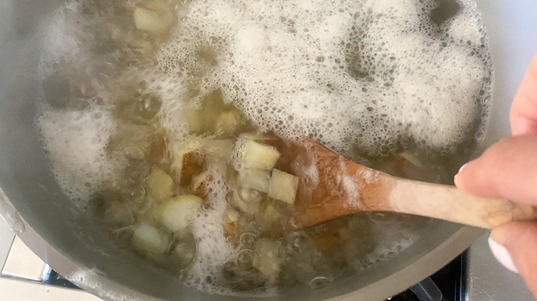 potatoes boiling in pot 