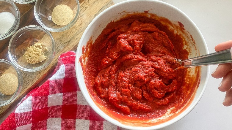 tomato paste in white bowl