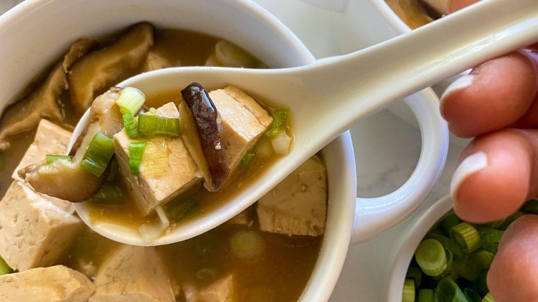 bowl of miso soup with spoon