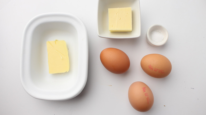 Omelet ingredients on white background