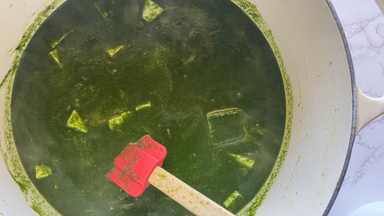 pot of palak paneer nearing completion