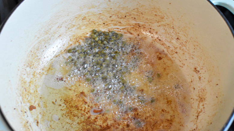 capers frying in bacon grease