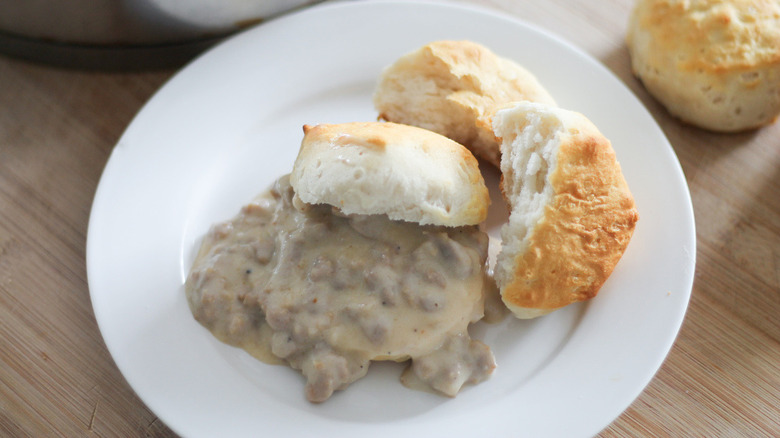 biscuit and gravy on plate