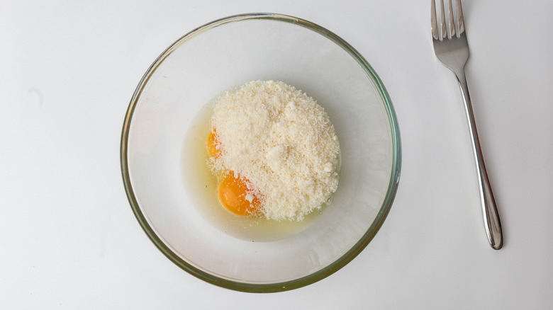eggs and parmesan in bowl 