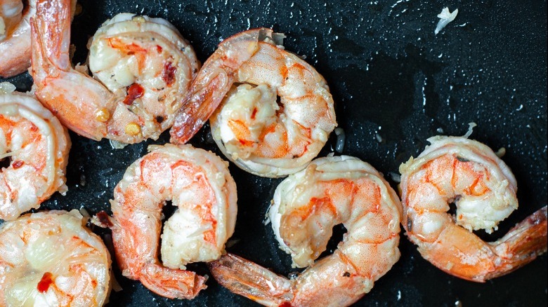 shrimp cooking in pan