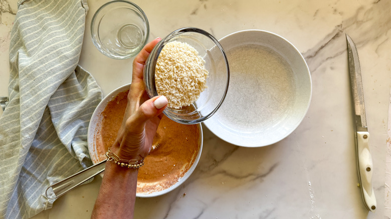 adding panko to bowl